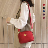 Mini sac à bandoulière en tissu Oxford