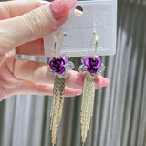 Boucles d'oreilles roses à franges élégantes et stylées
