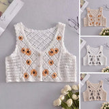 Gilet en tricot à marguerites