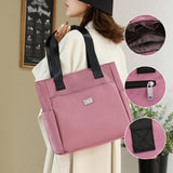 Sac à main polyvalent simple en nylon de couleur unie avec une grande capacité