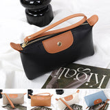 Pochette en cuir légère avec grand espace et fermeture éclair au poignet