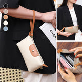 Pochette en cuir légère avec grand espace et fermeture éclair au poignet