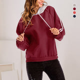 Sweat à capuche de couleur unie