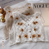 Gilet en tricot à marguerites