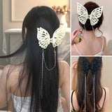 Grande pince à cheveux avec pompon et découpe papillon