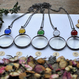 collier pendentif grande loupe