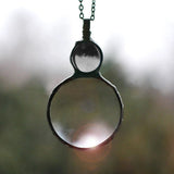 collier pendentif grande loupe