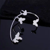 Boucles d'Oreilles Grimpeur Papillon à la Mode à l'Intérieur