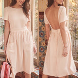 Robe dos nu à col rond et à la mode sexy