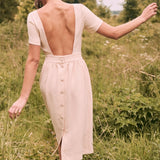 Robe dos nu à col rond et à la mode sexy