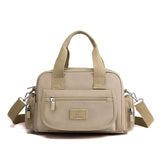 Sac à bandoulière étanche avec plusieurs poches pour femme