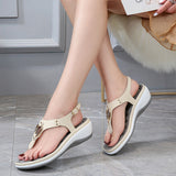 Sandales de plage compensées à tongs