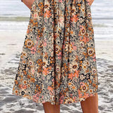 Robe mi-longue à encolure dégagée et imprimé floral avec poches