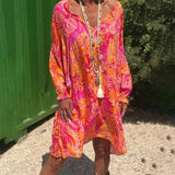 Robe mi-longue imprimée à manches longues