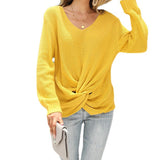 Pull en tricot noué