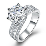 Bague six griffes classique torsadée en diamant