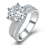 Bague six griffes classique torsadée en diamant
