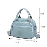 Sac à main fonctionnel à plusieurs compartiments de couleur unie