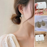 Boucles d'oreilles marguerites élégantes