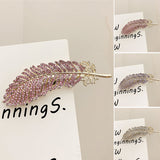 Barrette à plumes de diamant