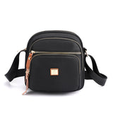 Sac à bandoulière léger et décontracté avec plusieurs poches pour femme