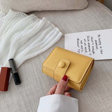 Mini sac à cosmétiques à bandoulière