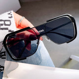 Lunettes de soleil à grande monture