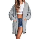 Cardigan à manches longues de couleur unie à capuche avec poche longue