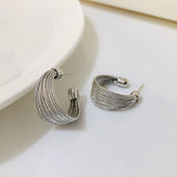 Boucles d'Oreilles Brossées en Forme de C
