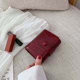 Mini sac à cosmétiques à bandoulière