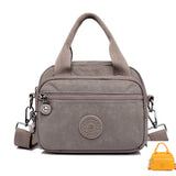 Sac à main fonctionnel à plusieurs compartiments de couleur unie