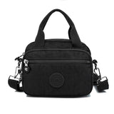 Sac à main fonctionnel à plusieurs compartiments de couleur unie