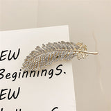 Barrette à plumes de diamant