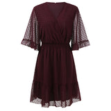 Robe en mousseline à volants et encolure en V