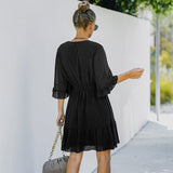 Robe en mousseline à volants et encolure en V